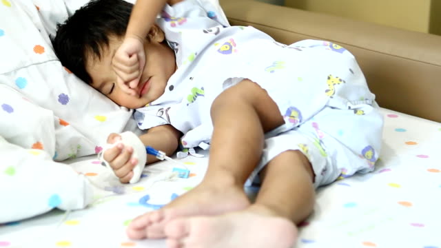 Thai-child-rubbing-his-eye