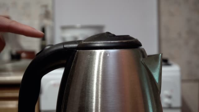 Switching-the-electric-kettle-on-and-off