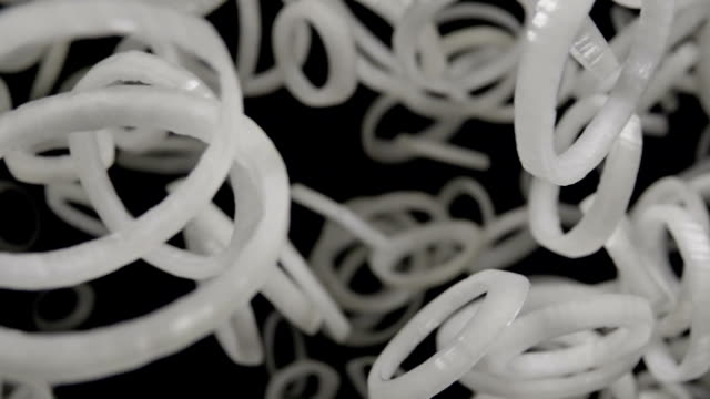 Falling-of-sliced-white-onion.-Slow-motion-240-fps