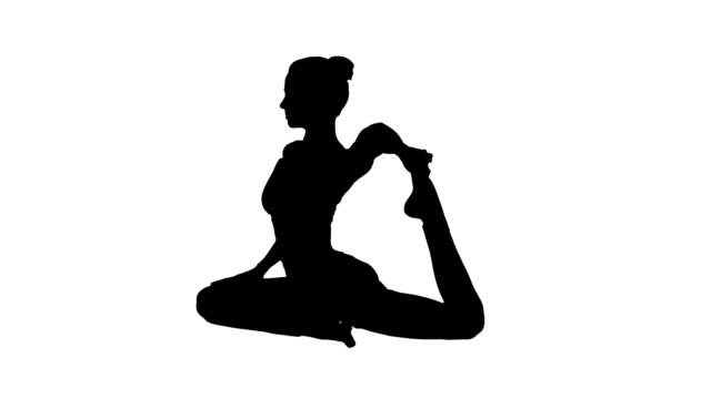 Silueta-hermosa-joven-womandoing-yoga-o-pilates-ejercicio.-Un-patas-rey-Pigeon-pose,-Eka-Pada-Rajakapotasana
