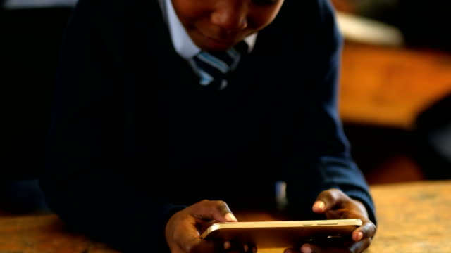Student-using-mobile-phone-in-the-classroom-4k