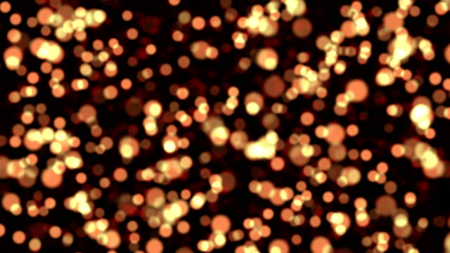 Abstract-bokeh-golden-particles