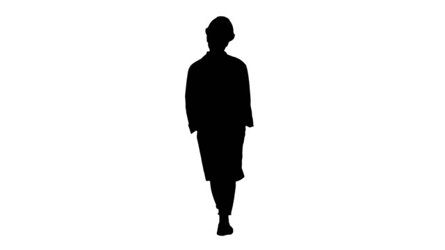 Silhouette-Frau-in-einem-weißen-Kittel-und-Schutzhelm-zu-Fuß