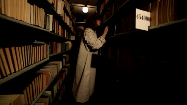 Terrible-woman-in-the-storehouse-of-books.