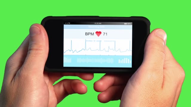 Man-Holds-Home-Device-to-Record-EKG