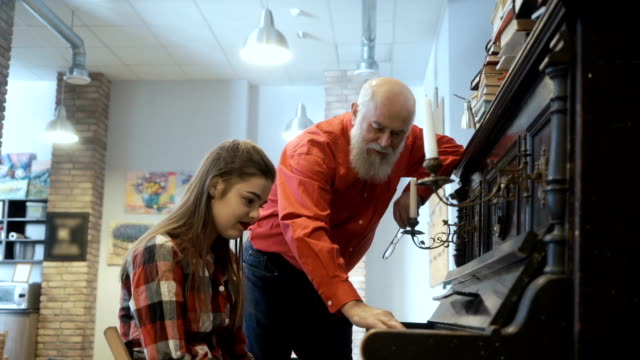 Grandfather-asks-granddaughter-to-play-the-piano-for-him