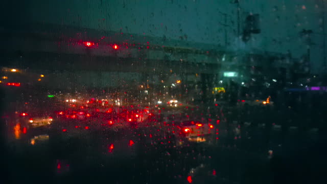 Traffic-jam-with-raining-on-city-road