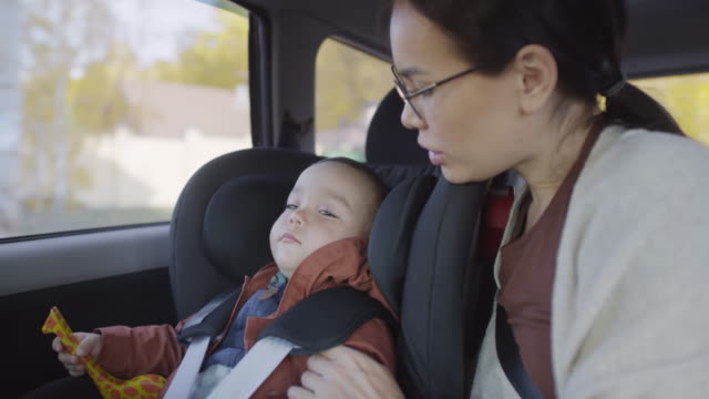 Mother-and-Little-Boy-in-Moving-Car
