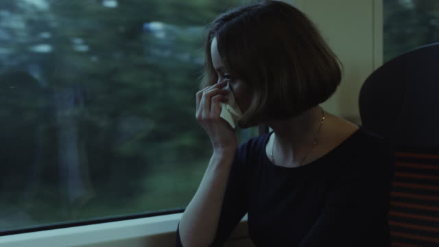 Woman-with-Common-Cold-in-Moving-Train
