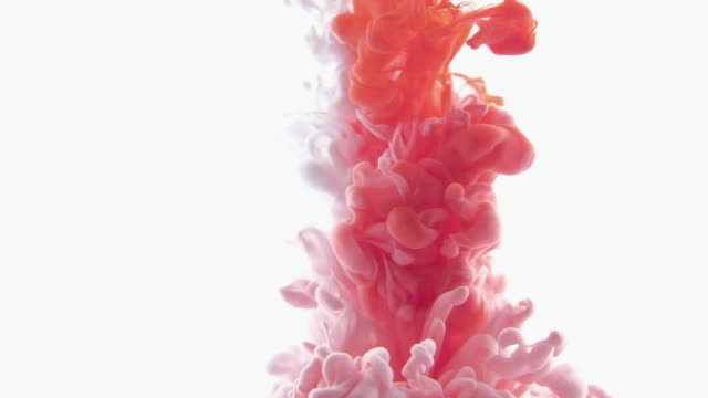 Red-and-White-color-paint-ink-drops-in-water-slow-motion-video-white-background-with-copy-space.-Inky-cloud-swirling-Abstract-isolated-smoke-explosion