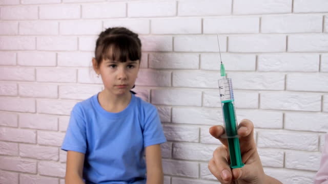 A-child-is-afraid-of-a-syringe.