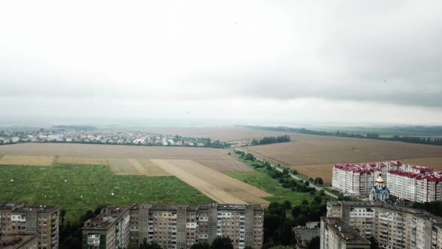 Aerial-view-of-town-with-socialist-soviet-style-of-building-at-cloudy-day.-Buildings-were-built-in-the-Soviet-Union.-The-architecture-looks-like-most-post-soviet-commuter-towns.