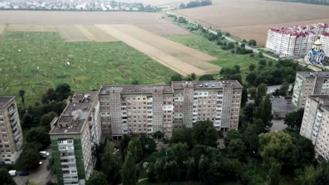 Aerial-view-of-town-with-socialist-soviet-style-of-building-at-cloudy-day.-Buildings-were-built-in-the-Soviet-Union.-The-architecture-looks-like-most-post-soviet-commuter-towns.