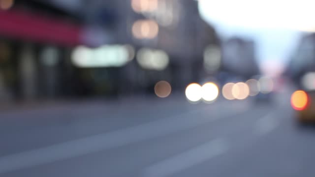Bokeh-car-light-at-night.-Out-of-focus-traffic-lights.