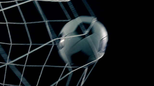 Football-Scores-Goal-In-Net-Closeup