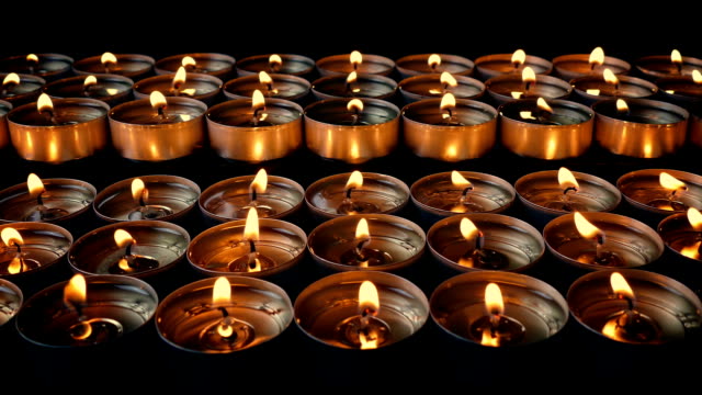Passing-Rows-Of-Small-Candles
