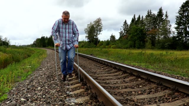 Disabled-trying-to-get-over-the-railroad-tracks