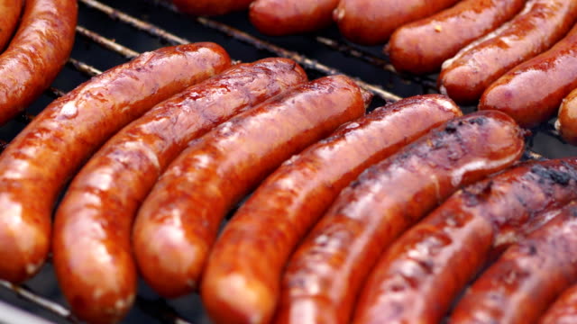 Sausages-on-the-grill-in-4k-slow-motion-60fps