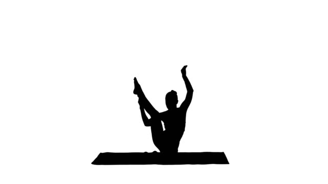 Silhouette-Sporty-yogi-girl-doing-fitness-practice,-stretches,-yoga-asana-Parivritta-Kraunchasana
