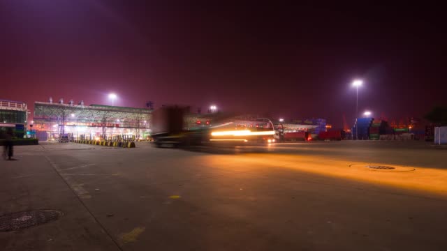 night-illuminated-shenzhen-city-port-entrance-traffic-panorama-4k-time-lapse-china