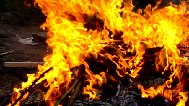 Close-up-of-fire-burn-wood-pile-with-slow-motion