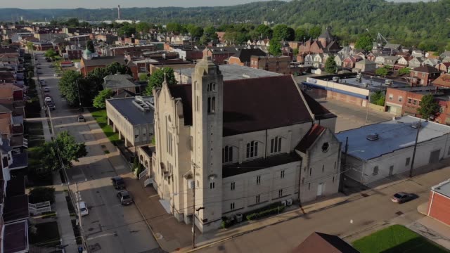 Morning-Forward-Aerial-Exterior-of-Church-in-Small-Town