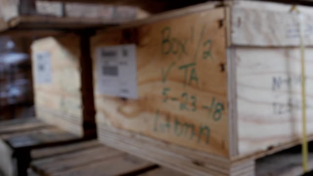 inscriptions-on-wooden-box-in-warehouse-of-customs-service-in-port