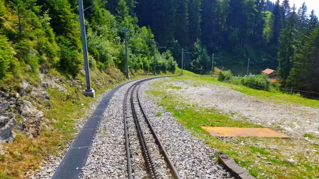 Riding-the-cogwheel-railway-to-Rochers-de-Naye,-Switzerland