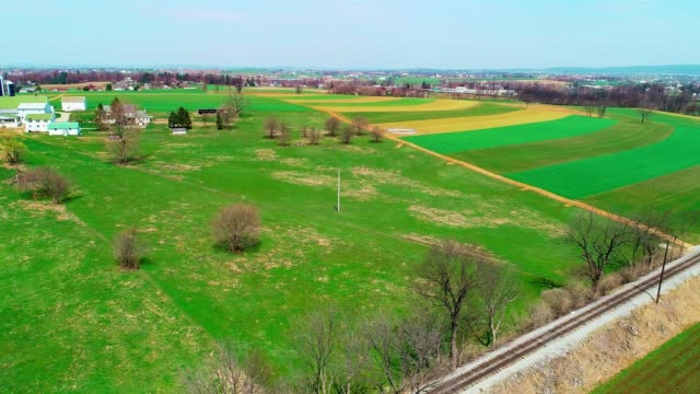 Train-Tracks-by-Amish-FarmLands-as-seen-by-Drone
