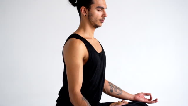 Man-meditating-in-lotus-position