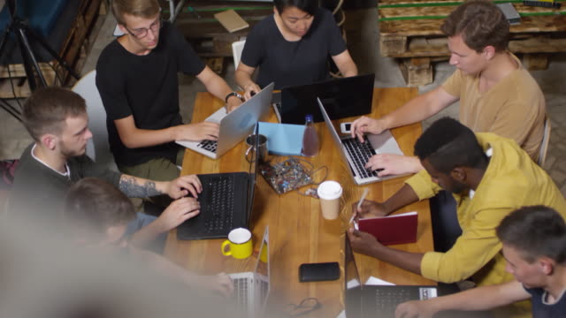 Young-People-Using-Laptops-Together