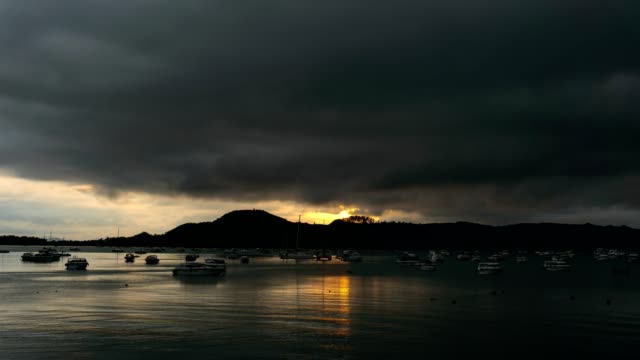 4k-timelapse-of-the-storm-clouds-over-the-andaman-sea,ao-chalong-harbor-in-phuket-Thailand