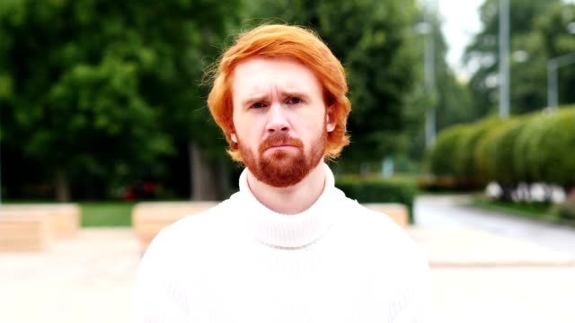 Portrait-of-Sad-Man-with-Red-Hairs,-Outdoor
