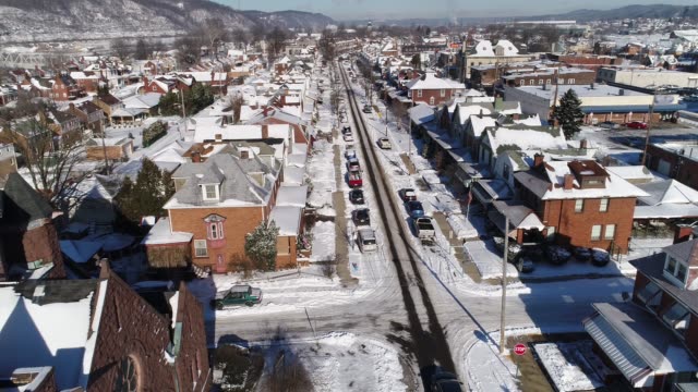 Slow-Forward-Aerial-View-Small-Rust-Belt-Town-in-Winter