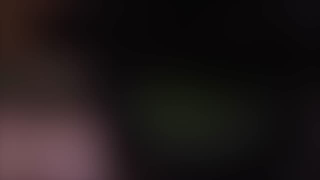 Abstract-light-leaks-on-black-background-for-transitions-video-footage