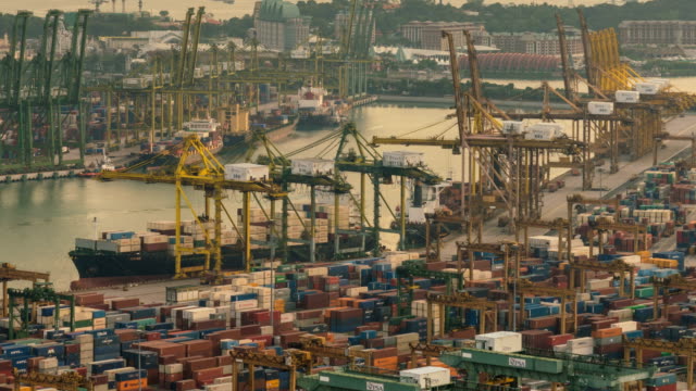 4K-time-lapse-:-working-crane-loading-bridge-in-shipyard
