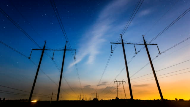 Day-to-night-time-lapse-of-high-voltage-power-lines