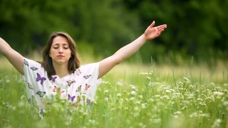 Woman-closely-connected-with-nature-makes-namaste-hand-sign,-feeling-oneness
