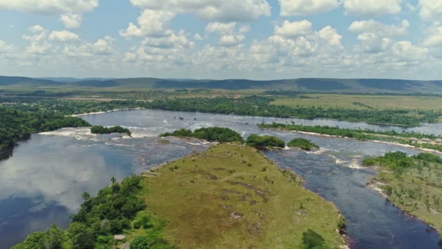 Aerial-view-of-Canaima-National-Park-and-the-Carrao-river-going-down-to-Canaima-lagoon