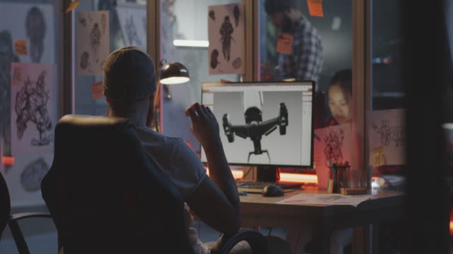 Man-modeling-an-airplane-on-computer