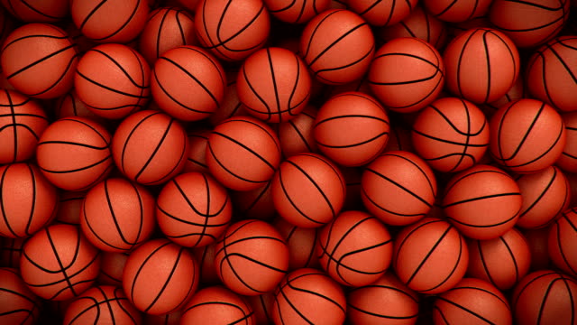 Basketballs-falling,-filling-the-picture,-transition-with-alpha
