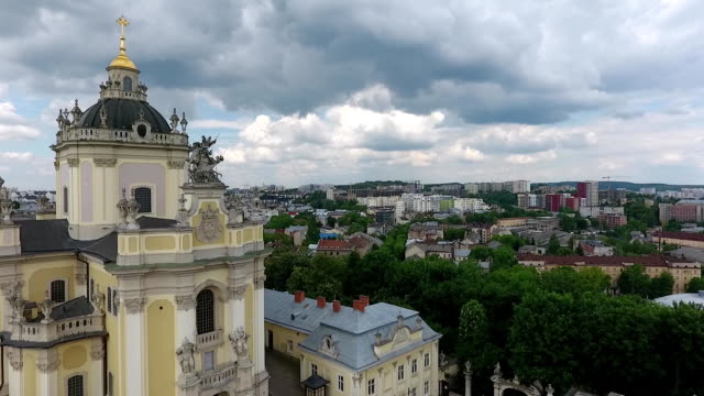 The-drone-flies-by-St.-George's-Cathedral-in-Lviv-and-shooting-city-under-clouds