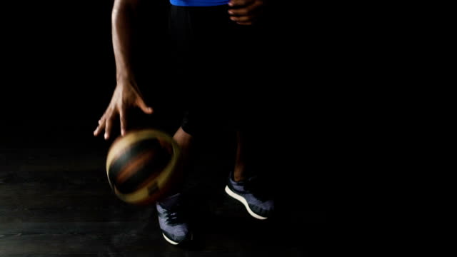Basketball-player-improving-ball-handling,-self-training,-popular-street-sport