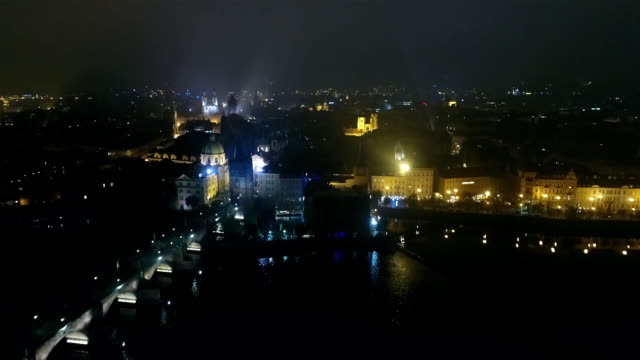 Night-panorama-of-Prague,-panoramic-view-from-the-air-to-the-old-town,-lights-of-the-night-city,-Prague