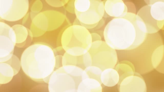 abstract-background-with-animated-glowing-gold--bokeh-loop