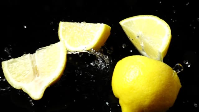 Falling-of-segments-of-a-lemon.-Slow-motion.
