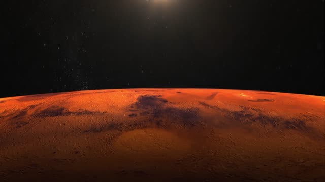 Planet-Mars-from-space.-Stars-twinkle.-Flight-over-the-Mars.-4K.-Sunrise.-The-Planet-Mars-slowly-rotates.-The-camera-moves-forward.