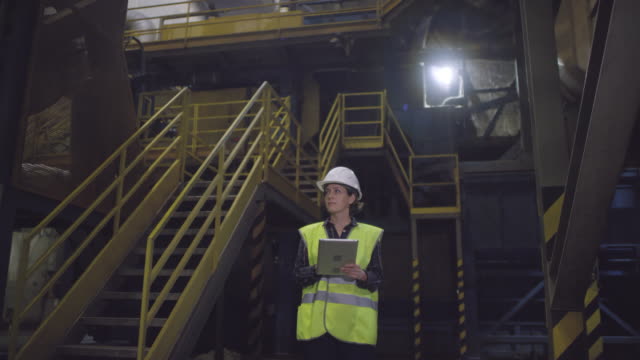 Caucasian-Female-Engineer-Working-at-Mineral-Wool-Plant