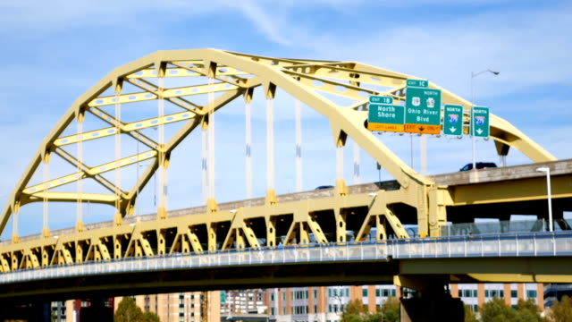 Traffic-crossing-the-Roberto-Clemente-Bridge-as-seen-from-North-Shore-on-bright-day