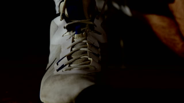 Basketball-player-wearing-shoes-in-the-court-4k
